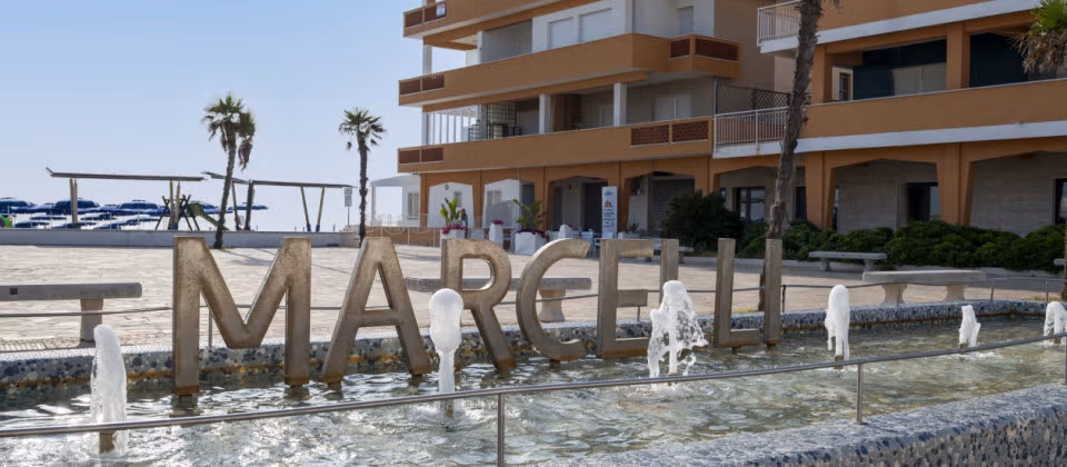 Photo of Marcelli square with the logo on the fountain